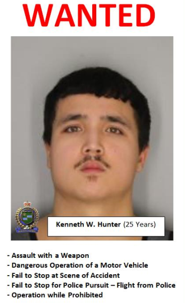 A 25-year-old man is wanted by police after allegedly hitting an officer with his vehicle and fleeing the scene in Niagara Falls, Ont.