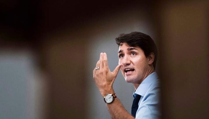 Prime Minister Justin Trudeau speaks to the media and students at Humber College regarding his government's new federally-imposed carbon tax in Toronto on Oct. 23, 2018.
