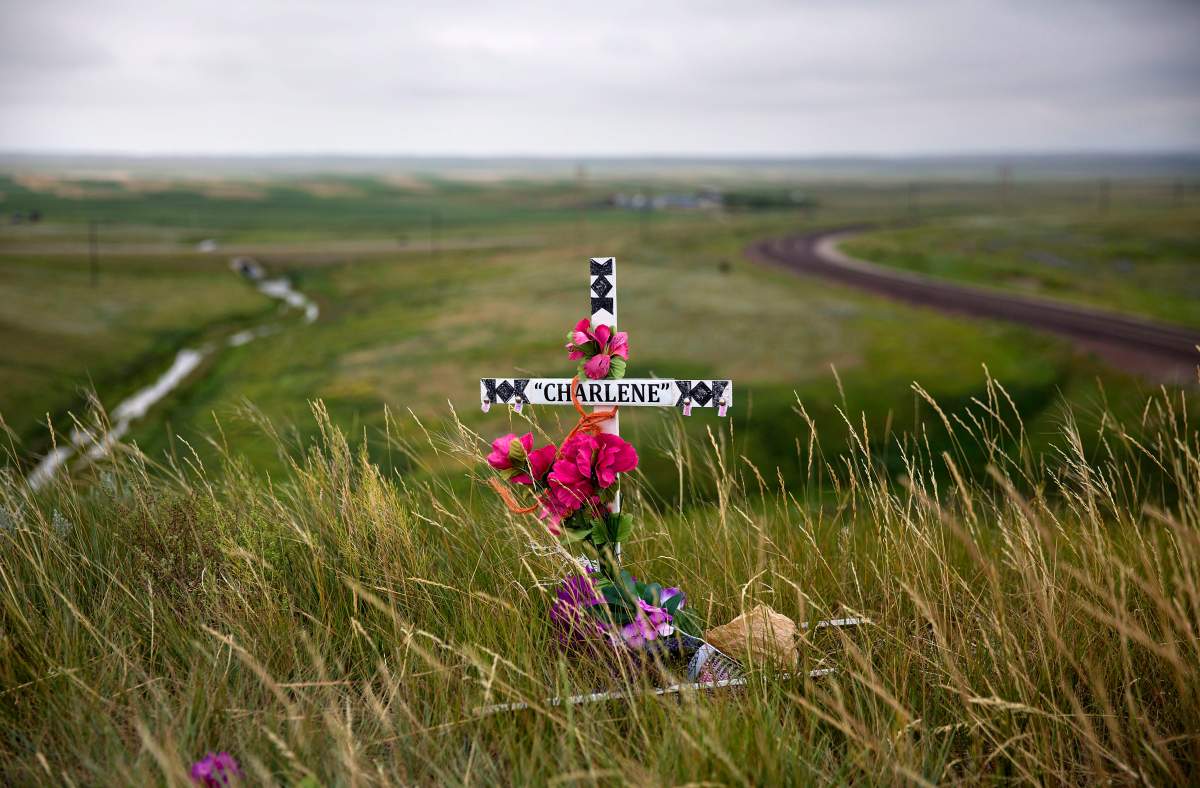 In this July 14, 2018, file photo, a makeshift memorial stands near the scene where Charlene Mancha was murdered by her husband last year on the Blackfeet Indian Reservation in Browning, Mont.