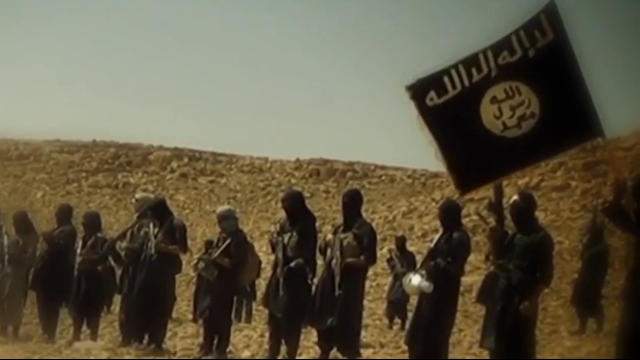 FILE - There are at least 24 Canadians in Kurdish custody in Syria for fighting with the so-called Islamic State.