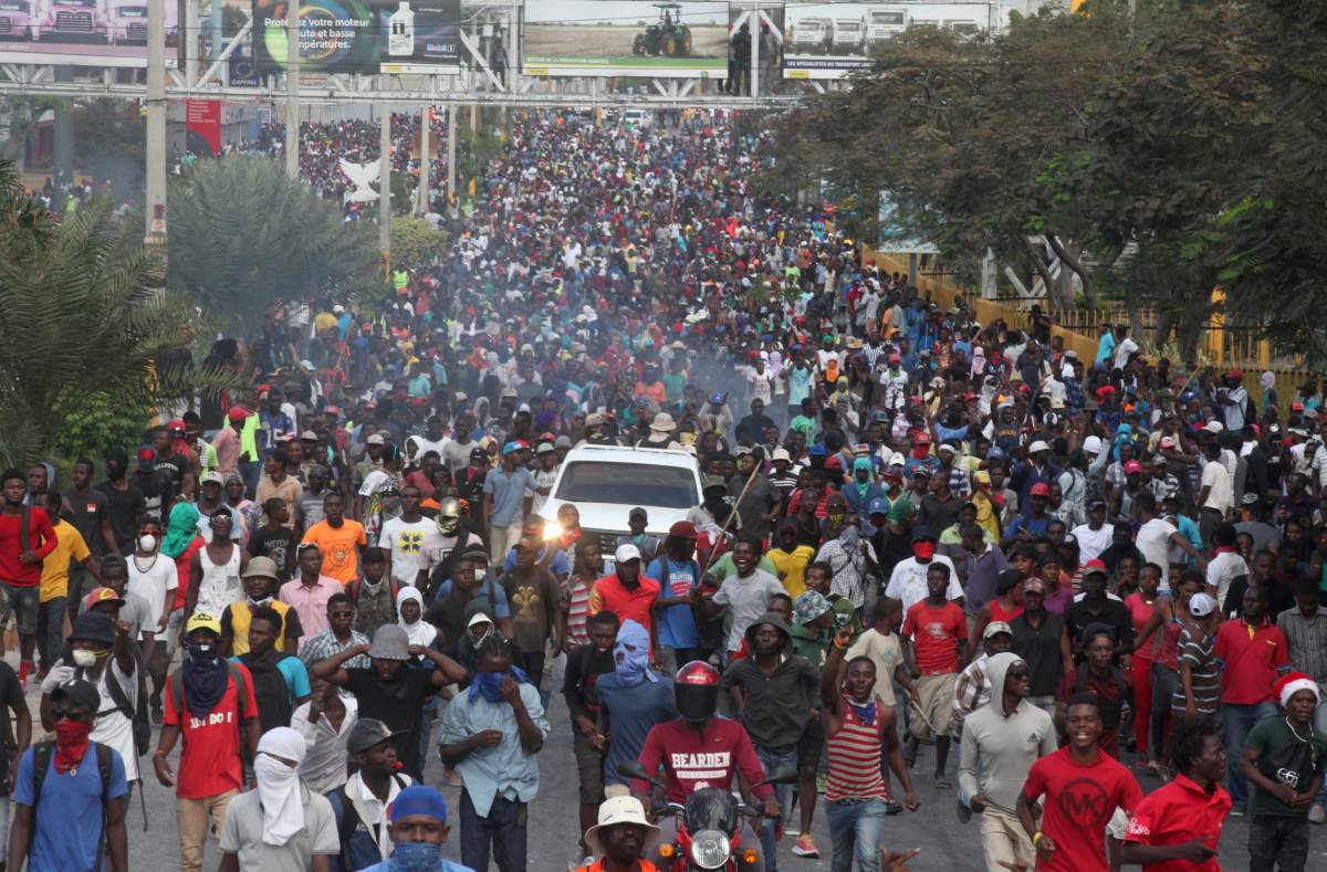 Demonstrators participate in an anti-government protest in Port-au-Prince, Haiti, February 12, 2019.
