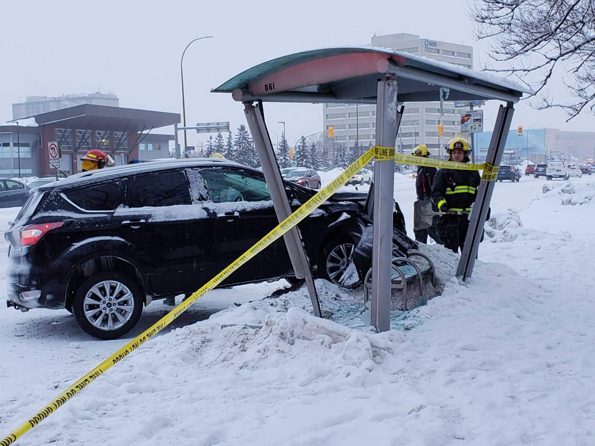 A vehicle is seen crashed into a bus shelter on Portage Ave.