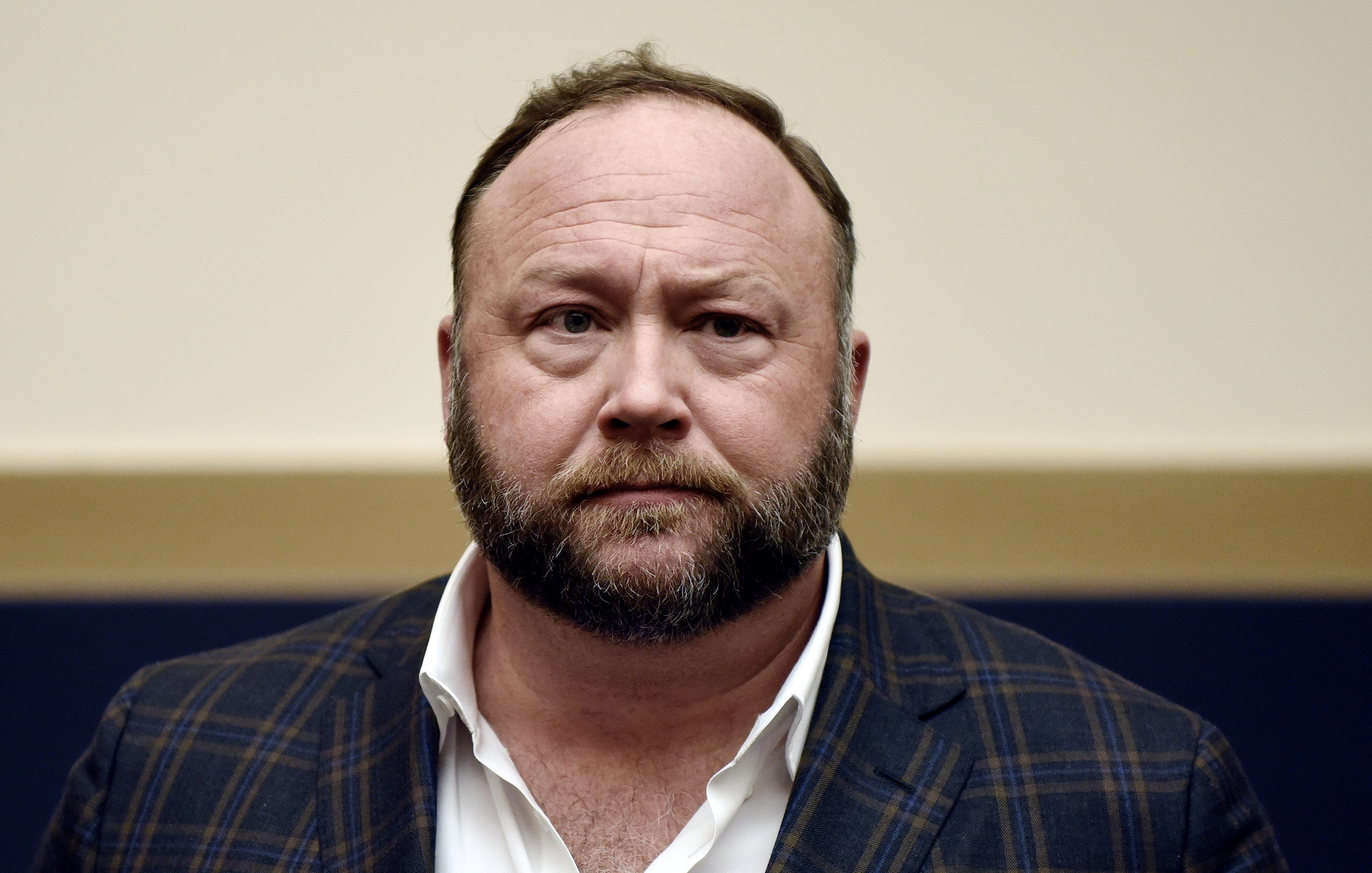 Infowars founder Alex Jones attends Google CEO Sundar Pichai's hearing before the House Judiciary committee on Capitol Hill December 11, 2018 in Washington, DC. 