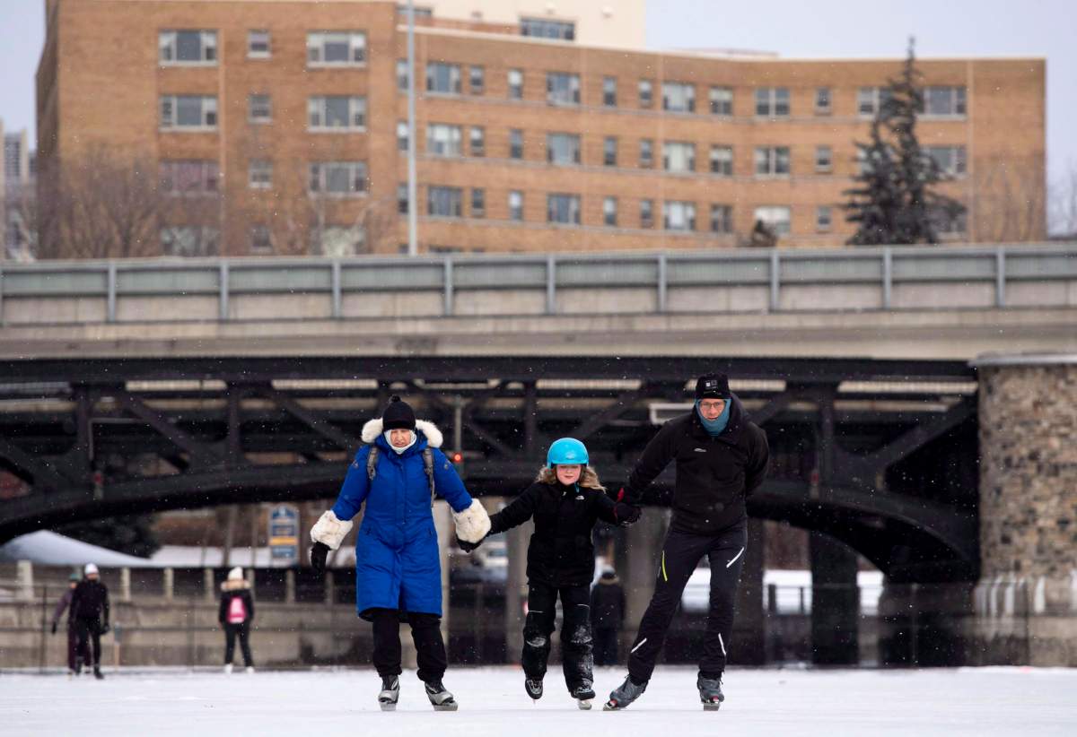 People skate on the Rideau Canal Skateway on its opening day in Ottawa on Sunday, Dec. 30, 2018. The Rideau Canal is a UNESCO World Heritage Site.