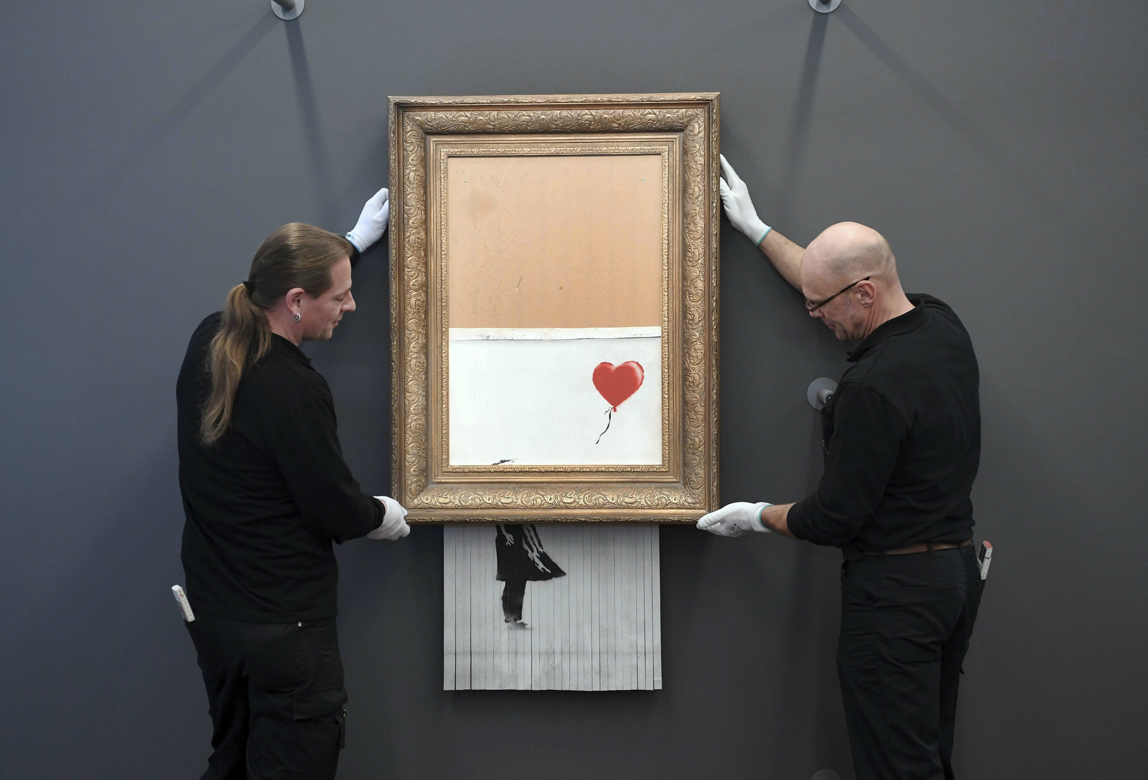 The shredded Banksy painting ‘Love Is in the Bin’ is exhibited at the Museum Frieder Burda in Baden-Baden on Feb. 4, 2019, where the work will be shown from Feb. 5 to March 3, 2019.