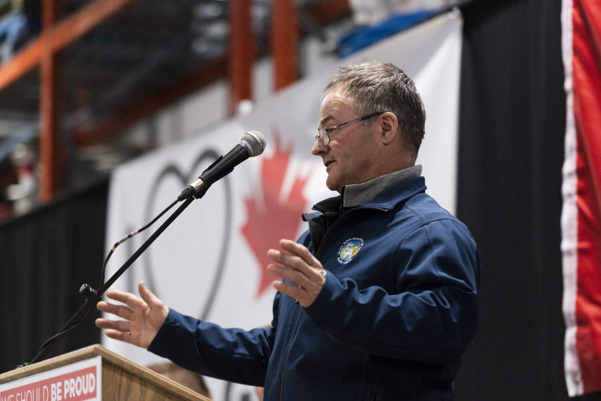 Reave of Ellice-Archie Barry Lowes speaks during a pro-pipeline rally at IJACK Technologies Inc. near Moosomin, Saskatchewan on Saturday February 16, 2019. Toward the end of the event, Lowes was brought on stage to inform the crowd about an train derailment that happened at 3 a.m. Saturday morning near the town of St. Lazare, Manitoba, about 60 kilometres from the rally. According to reports, about 37 tanker cars carrying crude oil were part of the derailment.