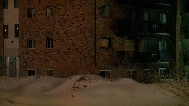 Saskatoon firefighters had to rescue three people from an apartment building who were trapped by a fire caused by a pot left on a stove.
