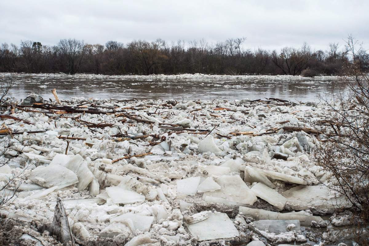 Ice is seen in the high waters of the Grand River in Brantford where residents were being evacuated due to flooding after an ice jam upstream of Parkhill Dam sent a surge of water downstream on Wednesday, Feb. 21, 2018.