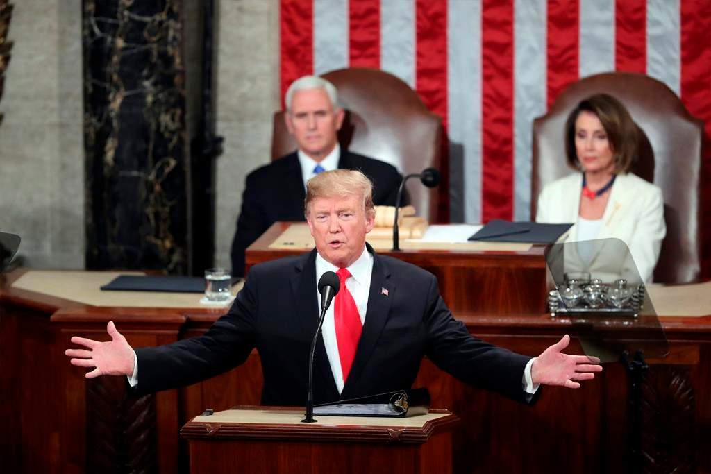 President Donald Trump delivers his State of the Union address to a joint session of Congress on Capitol Hill in Washington, as Vice President Mike Pence and Speaker of the House Nancy Pelosi, D-Calif., watch, Tuesday, Feb. 5, 2019.