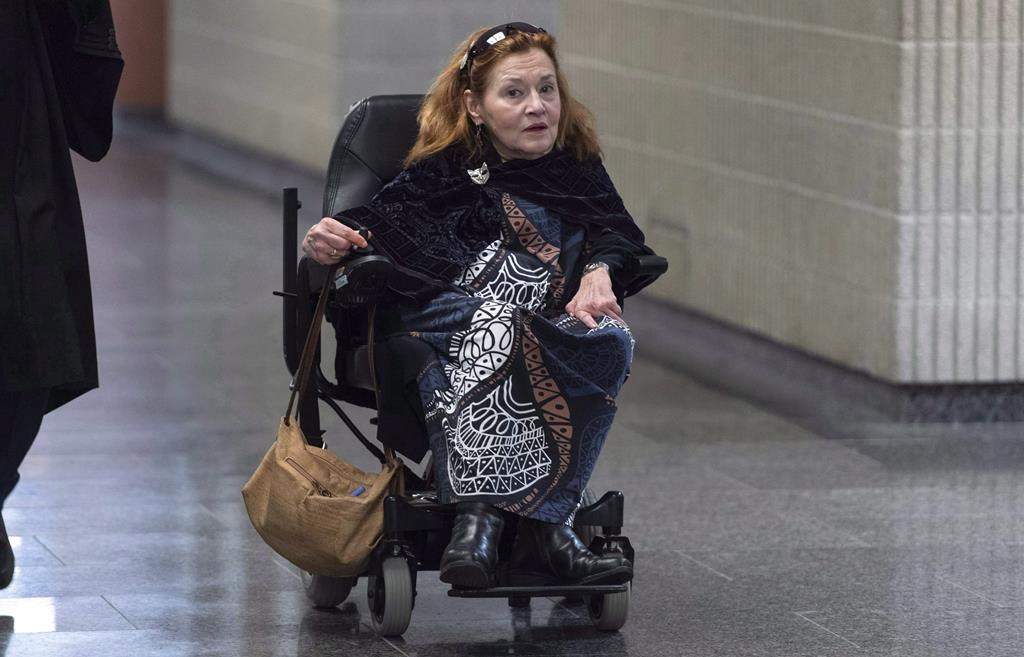 Nicole Gladu, who is incurably ill, arrives at the courthouse in Montreal on Monday, January 7, 2019, for the beginning of a trial challenging the provincial and federal laws on medically assisted death on the grounds they are too restrictive.
