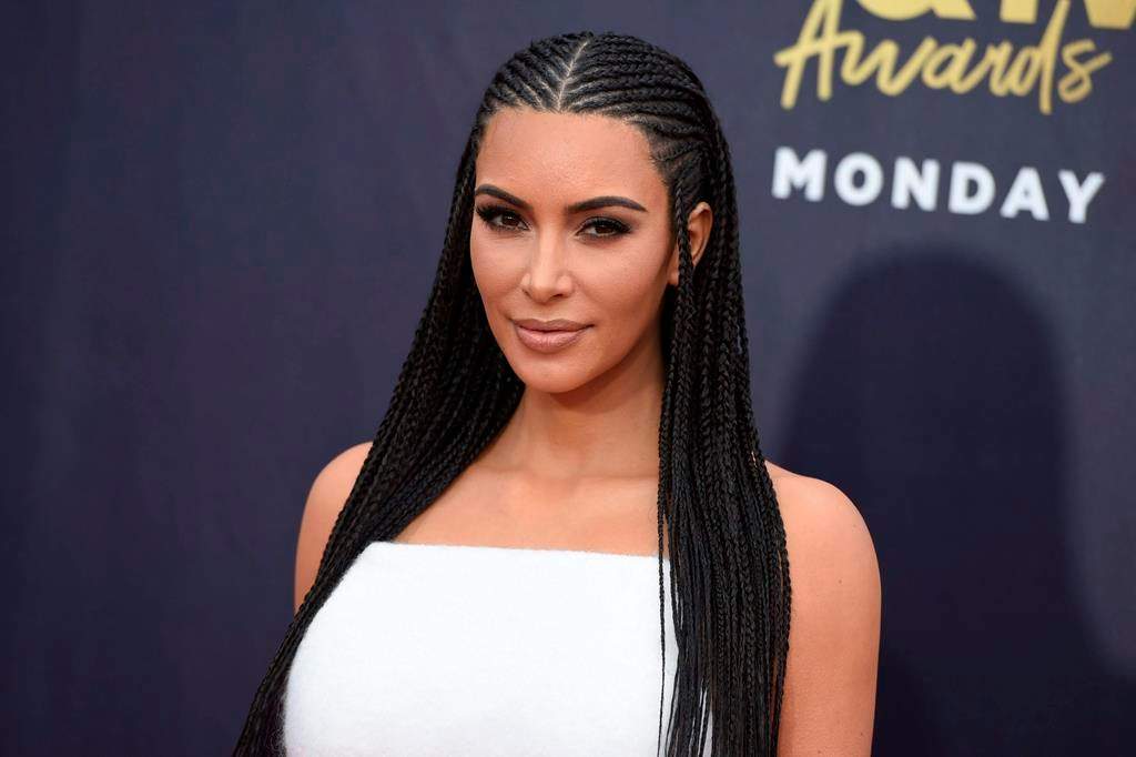 Kim Kardashian arrives at the MTV Movie and TV Awards at the Barker Hangar on Saturday, June 16, 2018, in Santa Monica, Calif.