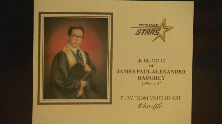 A plaque displayed on the side of the piano.