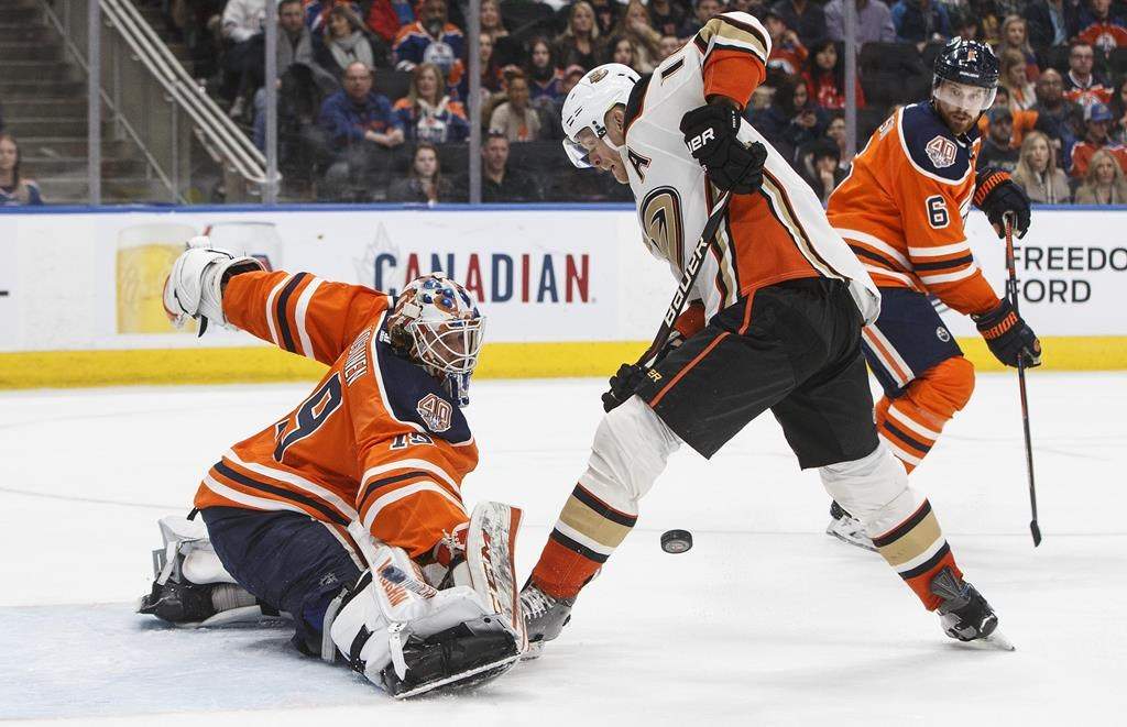 Anaheim Ducks' Corey Perry (10) is stopped by Edmonton Oilers' goalie Mikko Koskinen (19) during third period NHL action in Edmonton, Alta., on Saturday February 23, 2019. THE CANADIAN PRESS/Jason Franson.