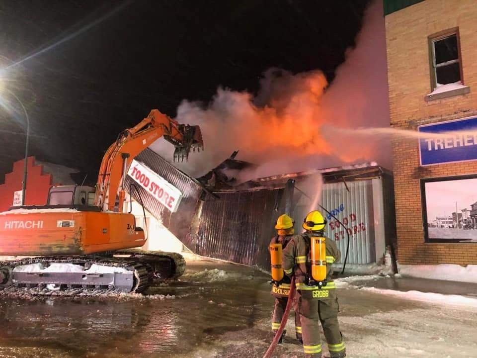 Crews are seen battling the blaze of Treherne's fire store.  
