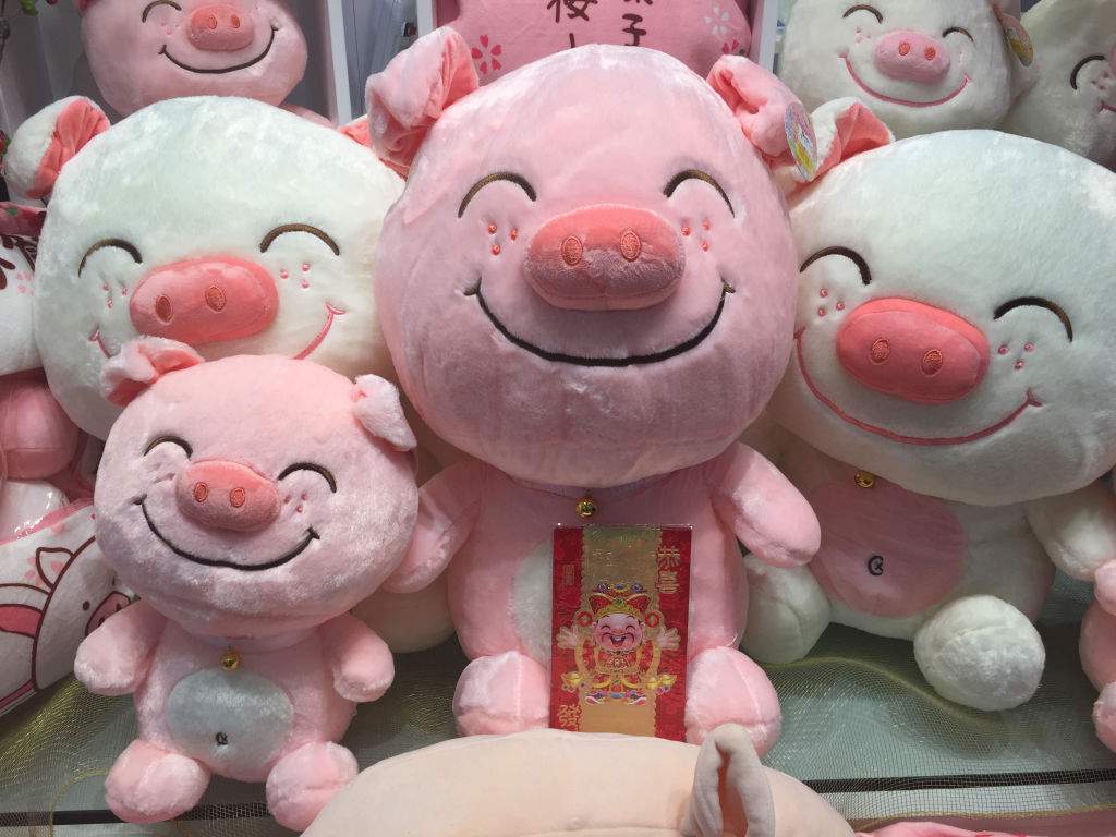 Plush pigs on display at a shop for the upcoming Spring Festival (Chinese Lunar New Year of the Pig) in Toronto, Ontario, Canada.