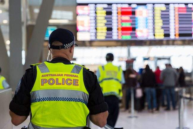 Australian Federal Police are seen at Sydney Airport in this July 30, 2017 file photo. RCMP say they arrested two men who conspired to import cocaine into Sydney, with the help of information from Australian police.