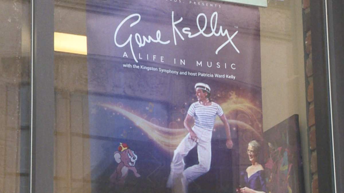 Gene Kelly poster in window of Kingston's Grand Theatre where performances will take place. 