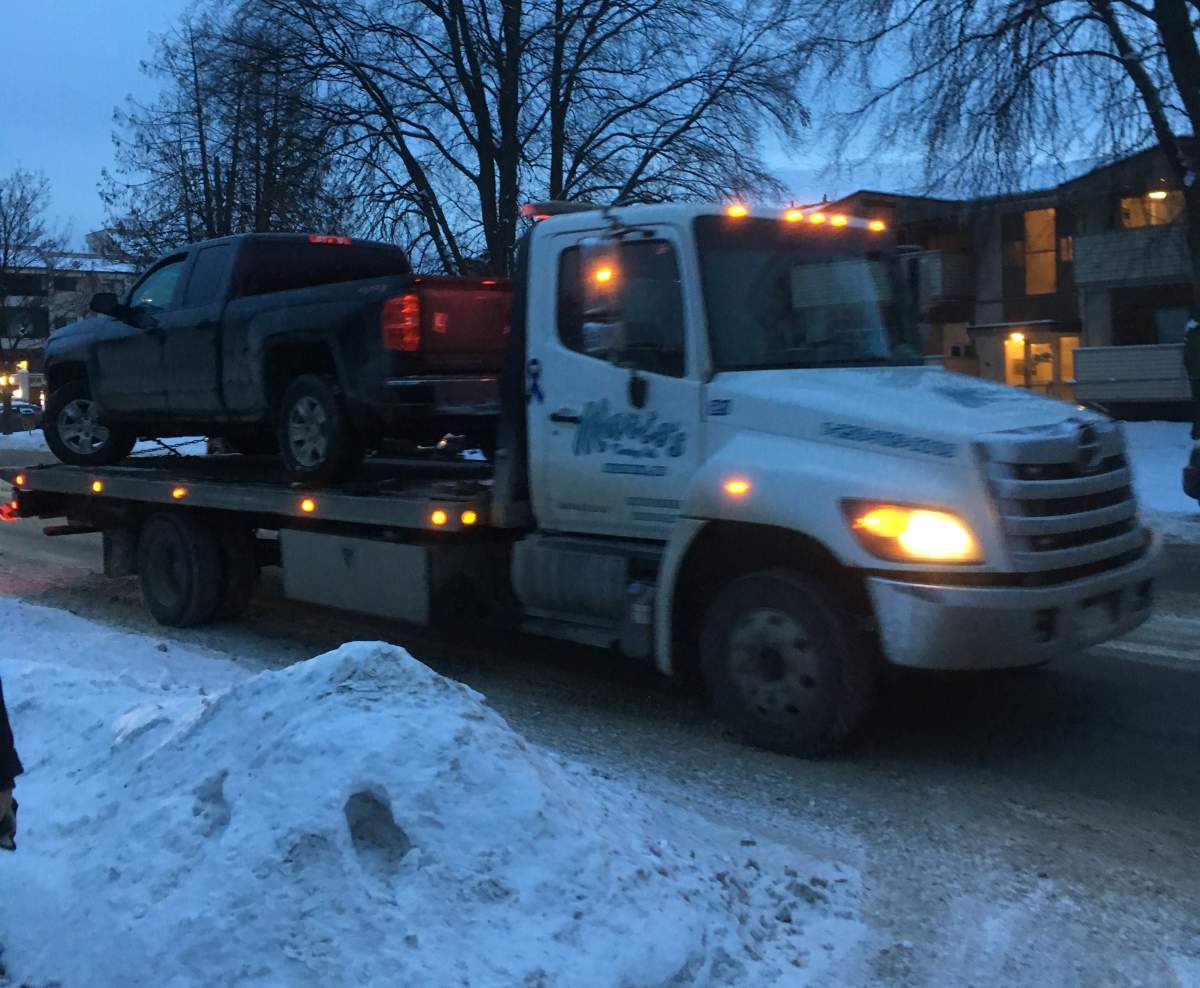 A black truck was towed from the scene.