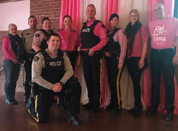 Members of the Kelowna RCMP gather for a photo during Pink Shirt Day on Wednesday.