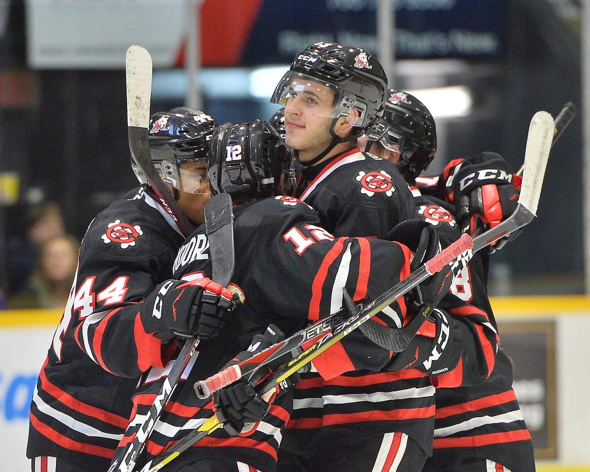The OHL has reduced its penalty against the Niagara IceDogs over a player recruitment violation.