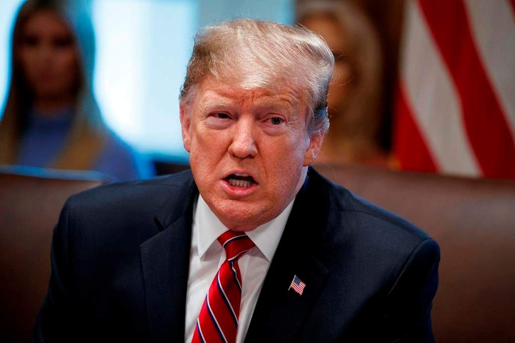 FILE - In this Tuesday, Feb. 12, 2019, file photo, President Donald Trump speaks during a cabinet meeting at the White House in Washington. The Senate resoundingly approved a border security compromise Thursday that ignores most of President Donald Trump's demands for building a wall with Mexico but would prevent a new government shutdown.