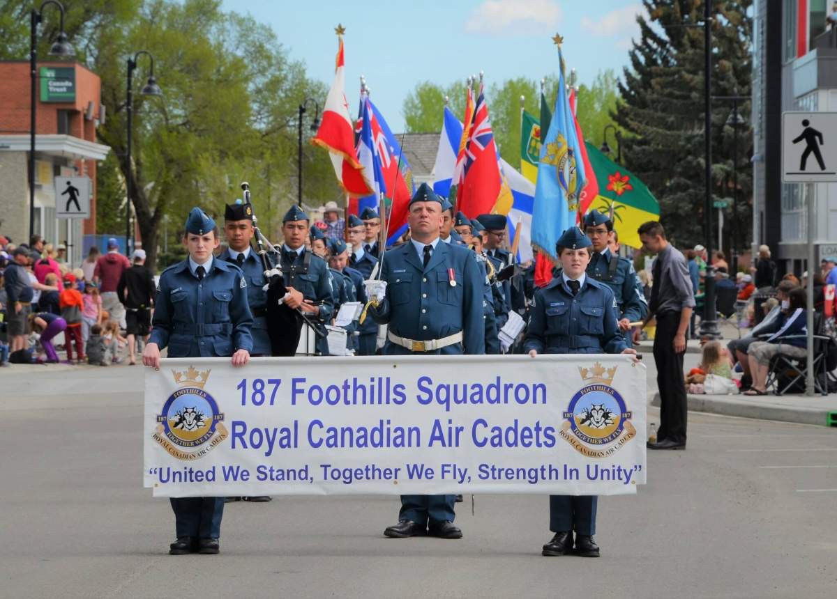 Capt. Reid Habing (centre) was greatly admired in the community, friends say.