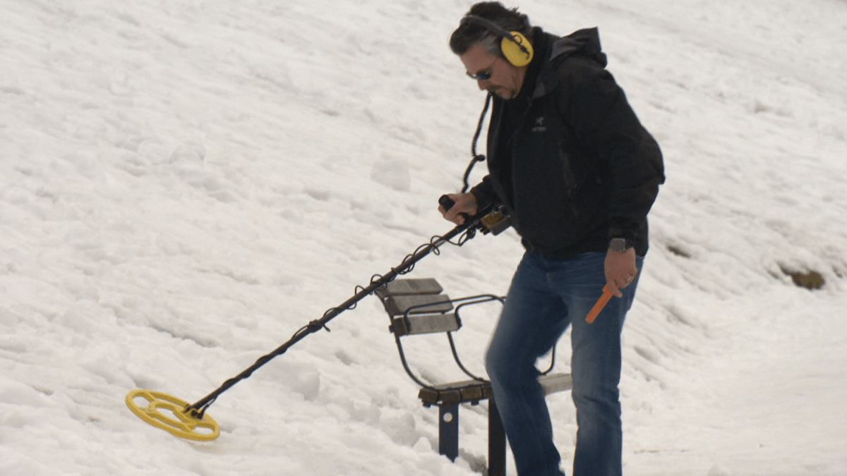 Chris Turner in action, looking for lost jewelry under the blanket of snow.
