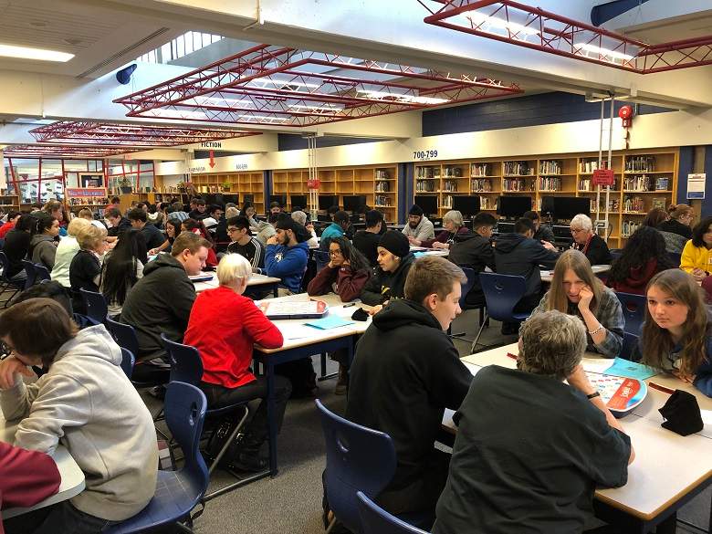 W.P. Wagner students join seniors for a game of Scrabble.