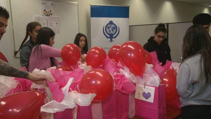 Members of Calgary's Sikh community prepared Valentine's Day care packages on Tuesday night.