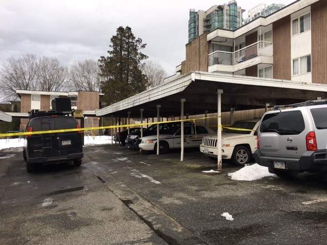 Police tape up at the Bristol Estates in Surrey Monday.