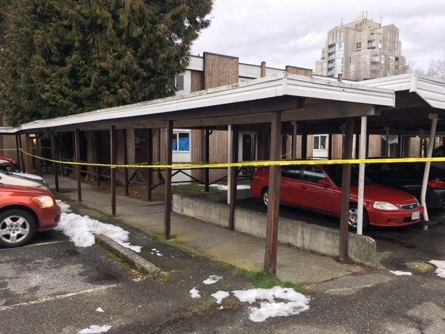 Police tape up at the Bristol Estates in Surrey Monday.