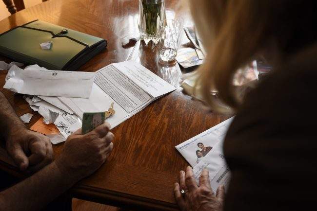 Sponsor Sandra Onufryk helps Syrian refugee Riad Al Blkihi with health card paperwork in Mississauga, Ont., Jan 8, 2016. 


