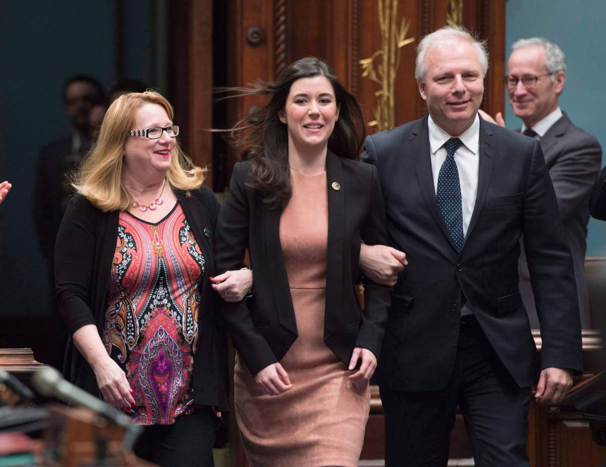 Catherine Fournier, centre, with Jean-François Lisée, right, and Carole Poirier in 2017.