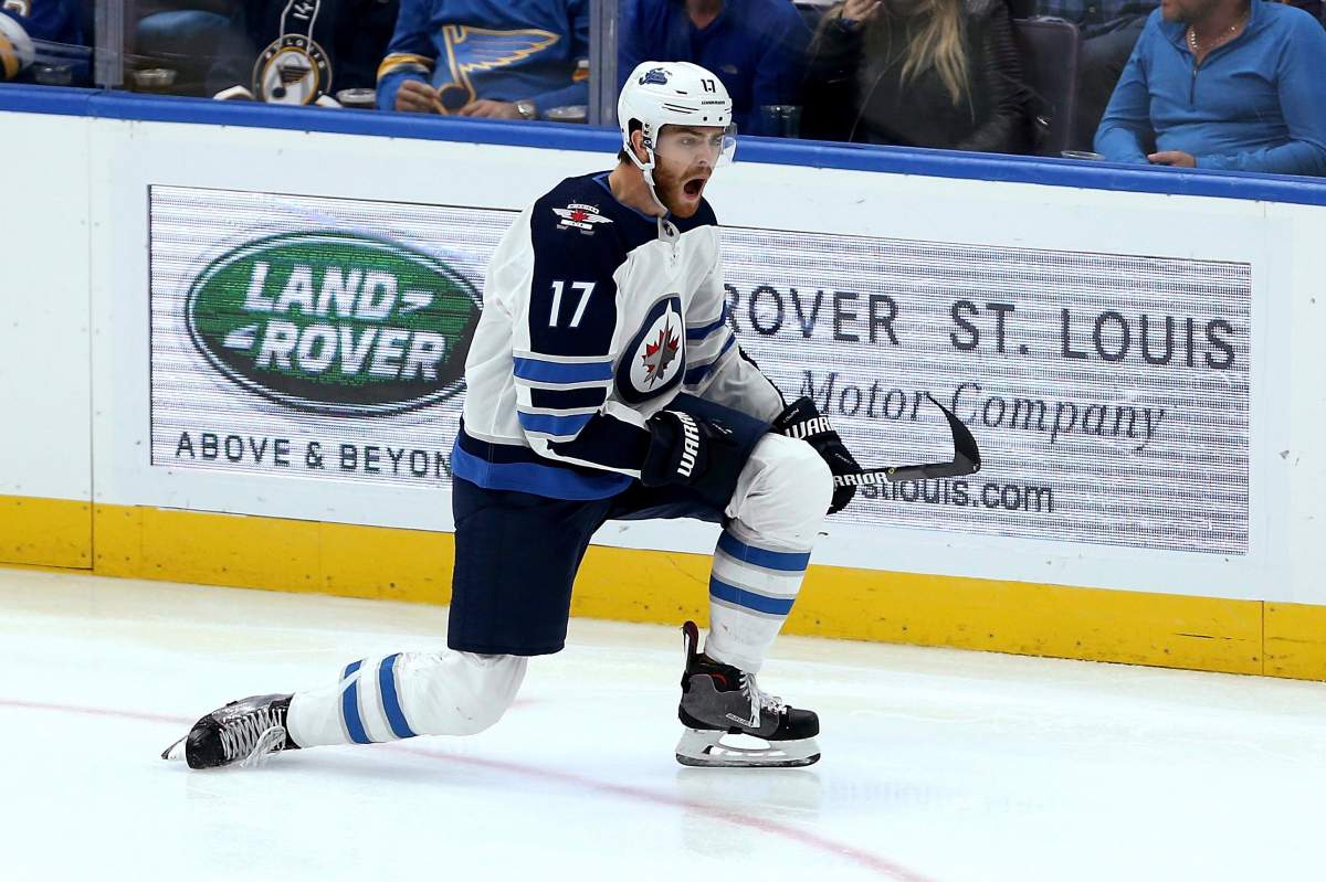 Winnipeg Jets centre Adam Lowry (17) celebrates after scoring an unassisted goal during the third period of the team’s NHL hockey game against the St. Louis Blues, Thursday, Oct. 4, 2018, in St. Louis.