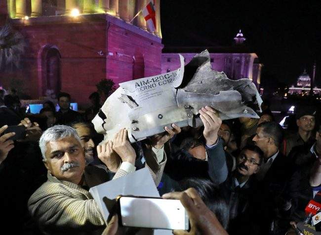Indian Air Force officials display wreckage of an air-to-air missile that they say was fired by a Pakistan Air Force fighter jet during a strike over Kashmir on Wednesday, after speaking with the media in the lawns of India’s Defence Ministry in New Delhi, India, February 28, 2019.
