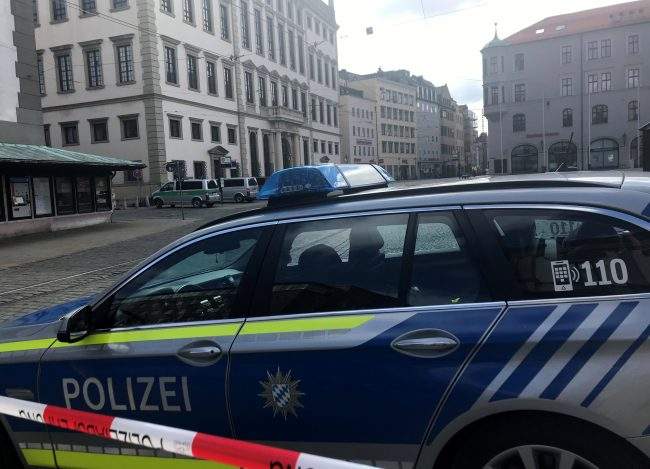 Police secure the area near the Augsburg town hall, Germany, March 26, 2019.
