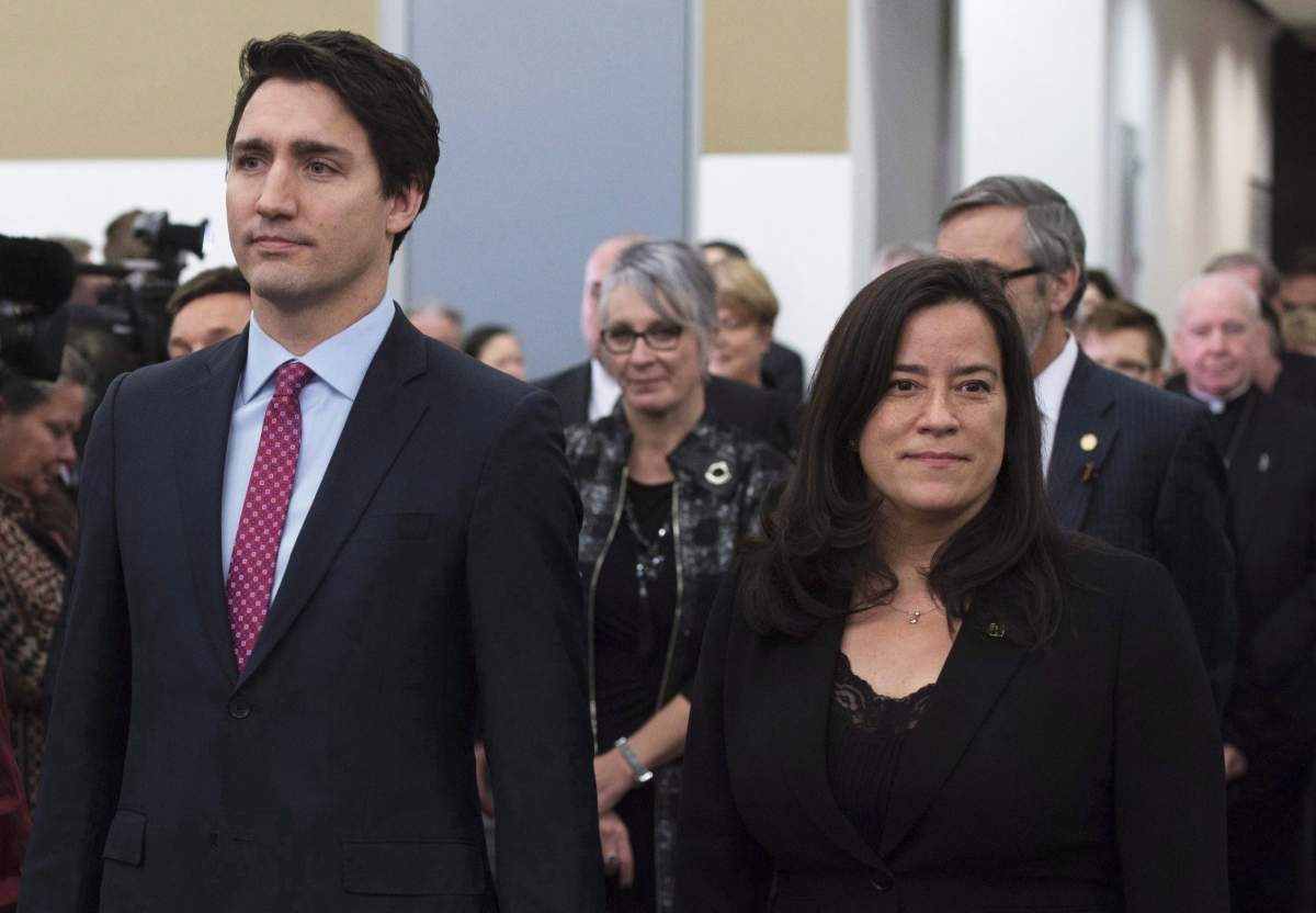 Prime Minister Justin Trudeau and Minister of Justice and Attorney General of Canada Jody Wilson-Raybould take part in the grand entrance as the final report of the Truth and Reconciliation commission is released, Tuesday, December 15, 2015 in Ottawa. THE CANADIAN PRESS/Adrian Wyld
