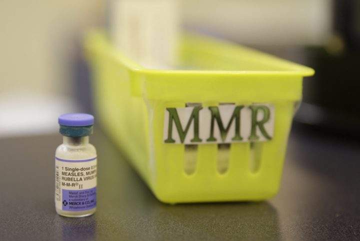 A measles, mumps and rubella vaccine is seen on a countertop at a pediatrics clinic in Greenbrae, Calif., on Feb. 6, 2015. 