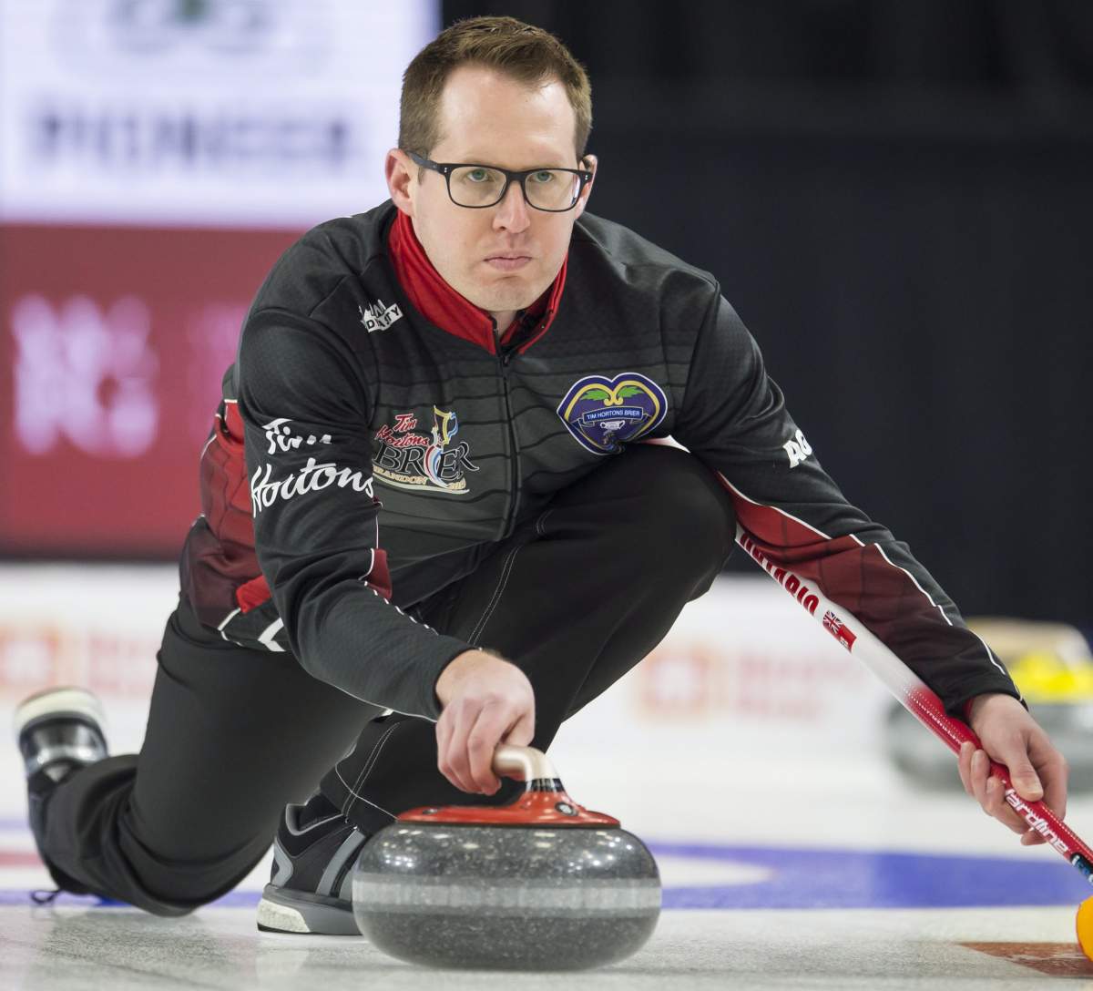 Team Ontario skip Scott McDonald makes a shot during the 10th draw against team Nova Scotia at the Brier in Brandon, Man. Tuesday, March 5, 2019.