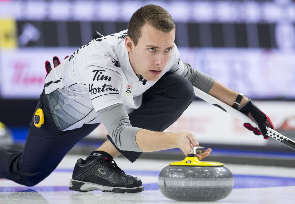 Team Wildcard skip Brendan Bottcher makes a shot during the 16th draw against team Alberta at the Brier in Brandon, Man., Thursday, March, 7, 2019.