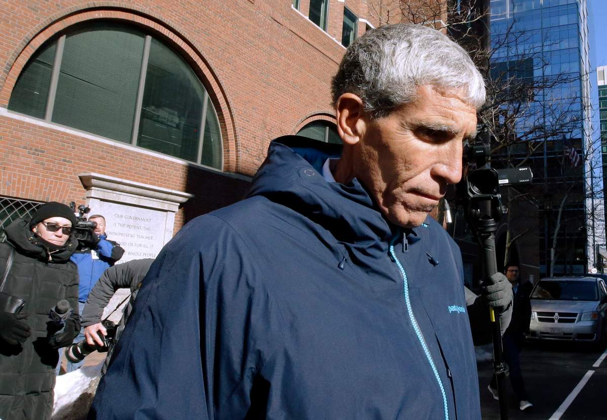 William “Rick” Singer founder of the Edge College & Career Network, departs federal court in Boston on Tuesday, March 12, 2019, after he pleaded guilty to charges in a nationwide college admissions bribery scandal.
