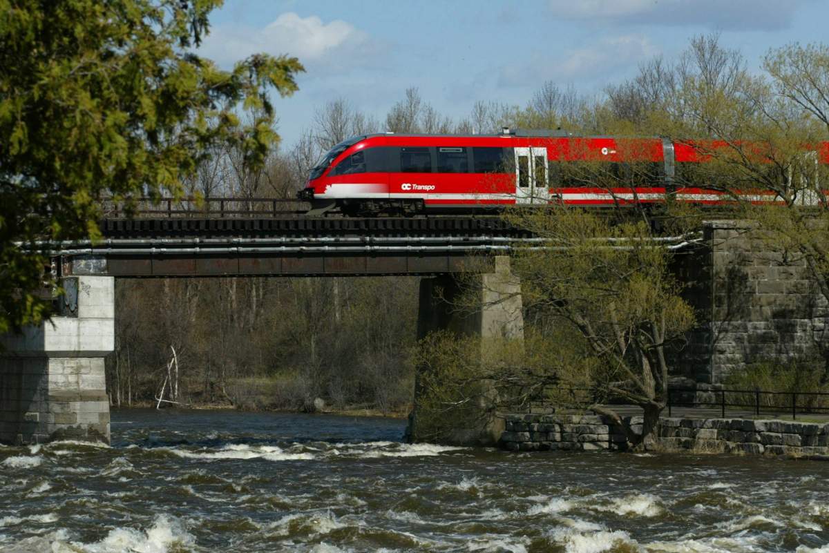 The OC Transpo light rail train in Ottawa Friday, May 3, 2002 makes its way though Ottawa.