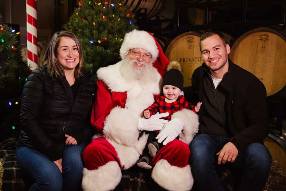 Ashley and Matt Reisig with their daughter Ayla just months before Matt was paralyzed with GBS.