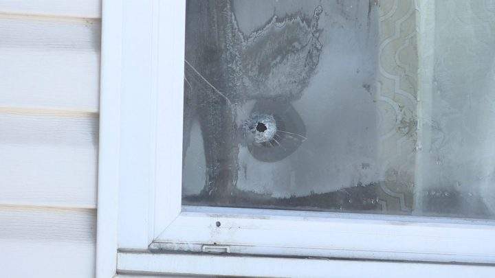 Police are investigating after a bullet hole was found in the window of a southeast Calgary home on Sunday.