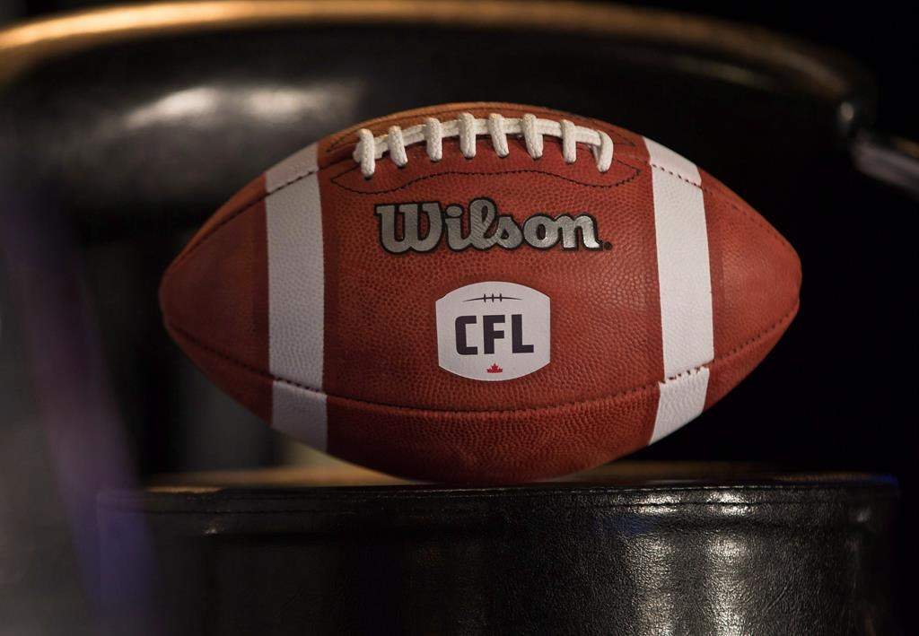 A football with the new CFL logo sits on a chair in Winnipeg, Friday, November 27, 2015.