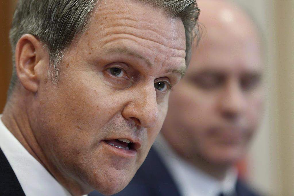 Cameron Friesen speaks to media at the Manitoba Legislature in Winnipeg, Tuesday, April 11, 2017. The Manitoba government is planning major changes to the administration of the province's health care system and is promising better care will result. THE CANADIAN PRESS/John Woods.