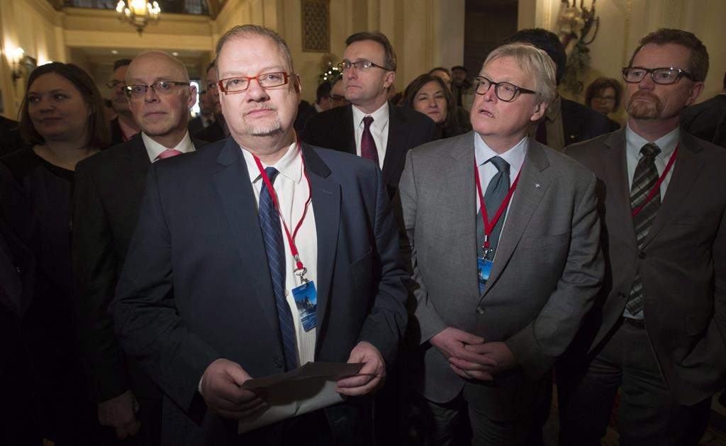 Minister Kelvin Goertzen, (centre left). The Manitoba government will be getting advice on education reform from a consultant who recently prompted Nova Scotia to eliminate elected school boards and make other sweeping changes. THE CANADIAN PRESS/Adrian Wyld