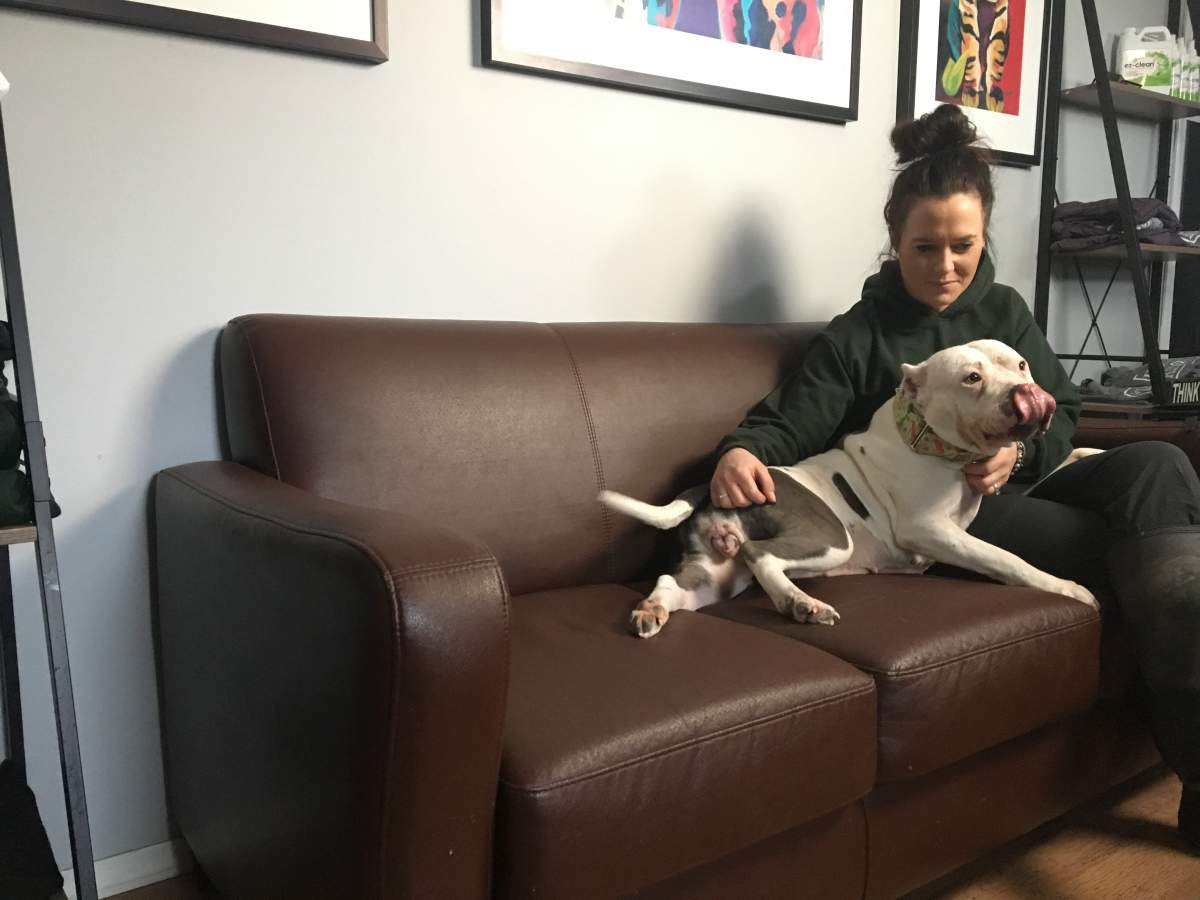 Sweetpea with owner and Saving Grace Animal Society executive director, Erin Deems.