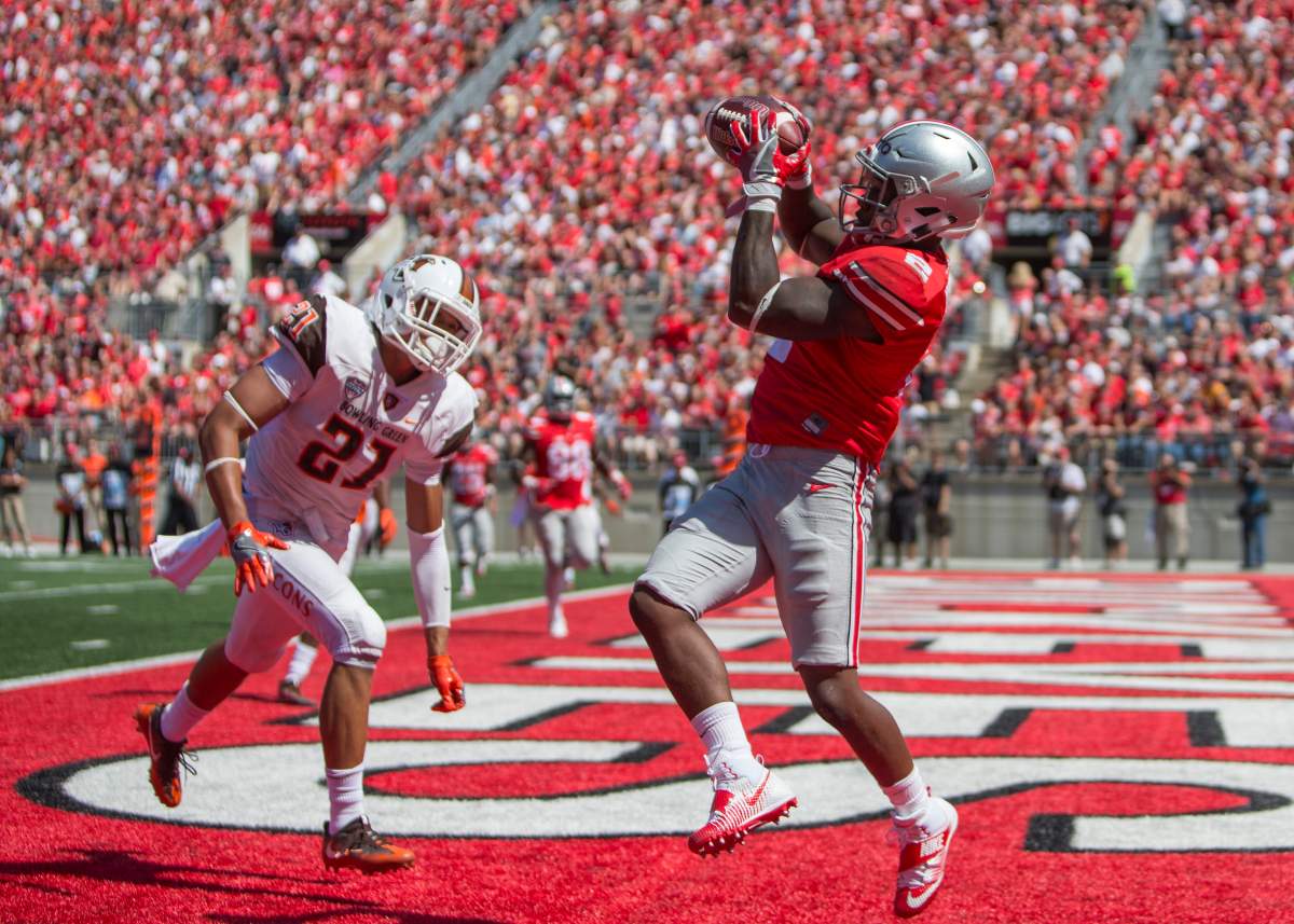 Ohio State Buckeyes wide receiver Dontre Wilson (2) catches the ball for a touchdown during the game between the Bowling Green Falcons and the Ohio State Buckeyes at Ohio Stadium in Columbus, Ohio. 