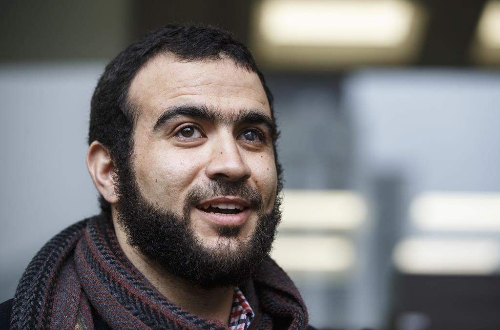 Former Guantanamo Bay prisoner Omar Khadr leaves court in Edmonton on Monday March 25, 2019.